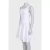 White dress with perforated skirt