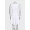White dress with perforated skirt