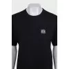 Black straight-cut T-shirt with embroidery
