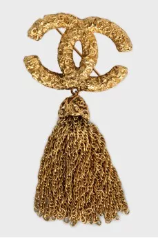 Vintage gold plated brooch with chains