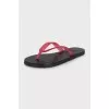 Beach flip-flops with tag