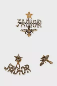 A set of earrings and a brooch