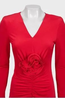 Red dress decorated with drapery