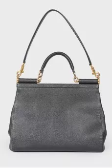 Black leather bag with golden fittings