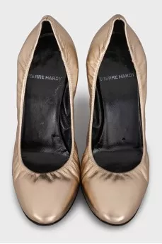 Gold leather high heels