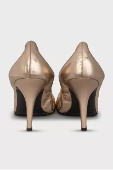 Gold leather high heels