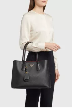 Black leather tote with gold logo