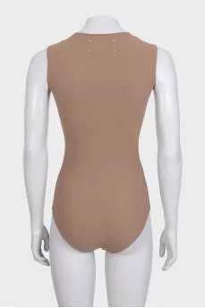 Sleeveless bodysuit with snaps