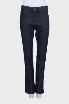 Dark blue straight-leg jeans with a button