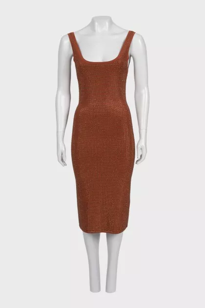 A brown bodycon dress decorated with rhinestones