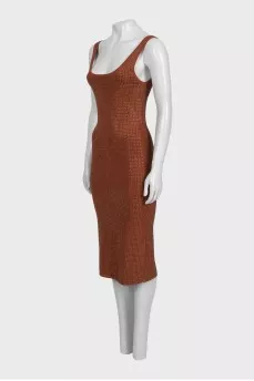 A brown bodycon dress decorated with rhinestones