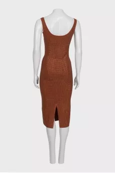A brown bodycon dress decorated with rhinestones