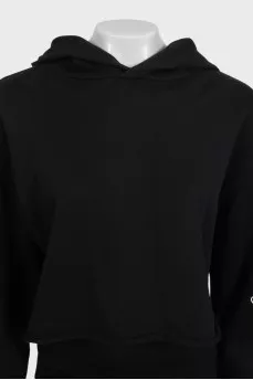 Black cropped hoodie with contrasting print on the sleeve