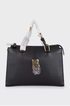 Black leather tote bag with tag
