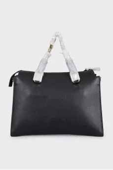Black leather tote bag with tag