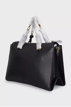 Black leather tote bag with tag