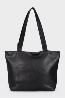Black leather tote bag with gold buckle