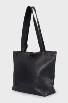 Black leather tote bag with gold buckle