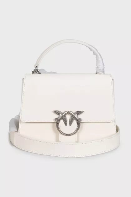 White leather satchel with tag