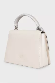 White leather satchel with tag
