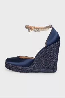 Blue textile shoes with a woven wedge heel