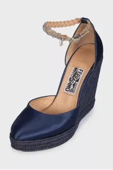 Blue textile shoes with a woven wedge heel