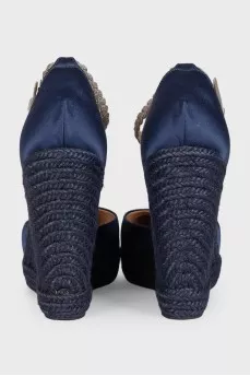 Blue textile shoes with a woven wedge heel