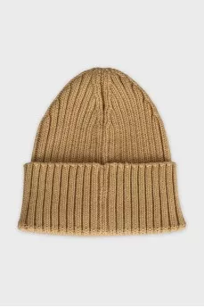 Beige hat decorated with branded embroidery