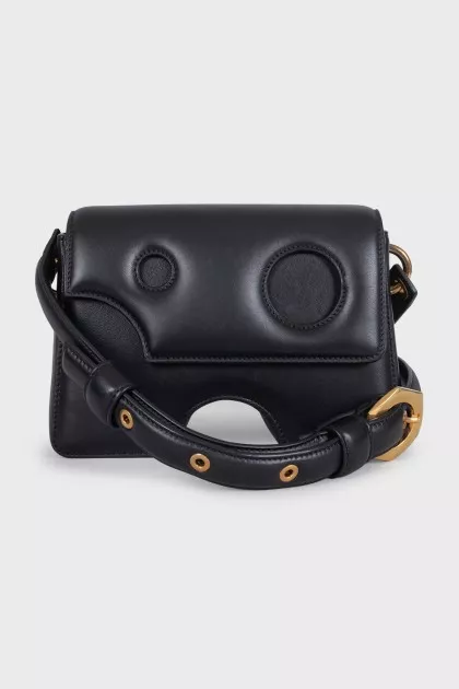 Leather bag with a figured shape