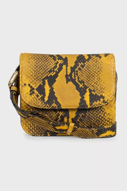 Yellow leather bag with embossed print