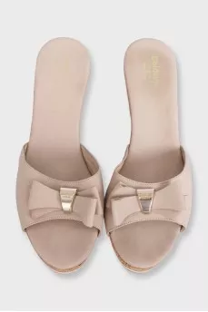 Beige leather mules with a wooden platform