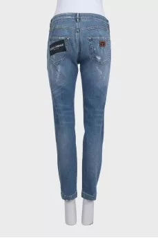 Рваные джинсы slim fit синего цвета на средней посадке
