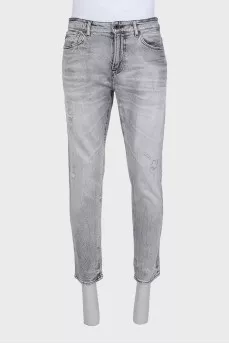 Men's straight-fit jeans with a distressed effect