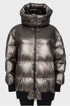 Short green down jacket with a tag
