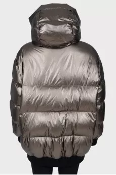 Short green down jacket with a tag