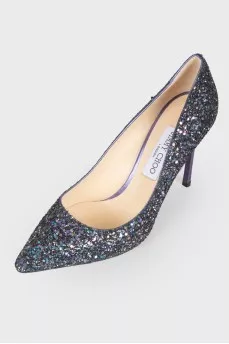 Shoes with a sharp toe, decorated with purple sequins