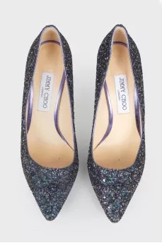 Shoes with a sharp toe, decorated with purple sequins
