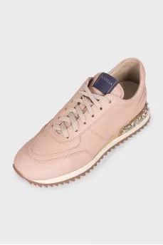 Pink leather sneakers decorated with crystals