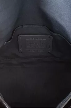 Blue leather bag with brand logo