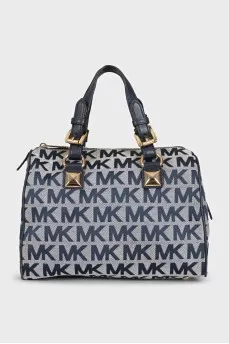 A textile bag with a signature print and handles