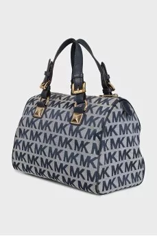 A textile bag with a signature print and handles