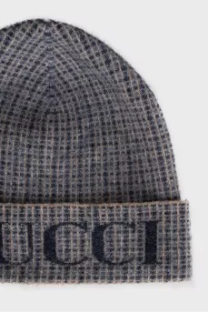 Men's beanie with a checkered print and logo