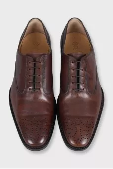 Men's brown leather shoes with perforated toes