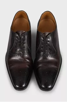 Men's brown leather shoes with perforated toes