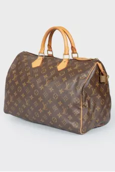 Коричневая кожаная сумка Speedy с фирменной расцветкой бренда