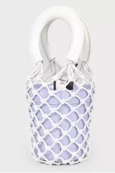 A purple bag with a net and white handles, there is a tag