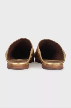 Мюлі із золотистої шкіри на плоскій підошві
