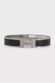 Silver bracelet with leather insert
