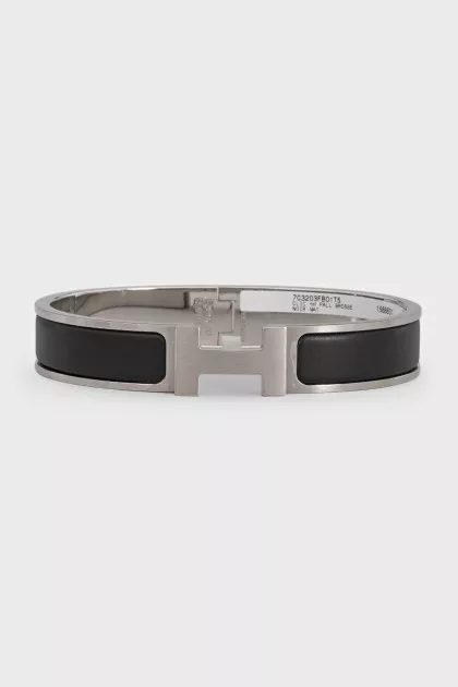 Silver bracelet with leather insert
