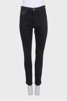 Black mid-rise skinny jeans